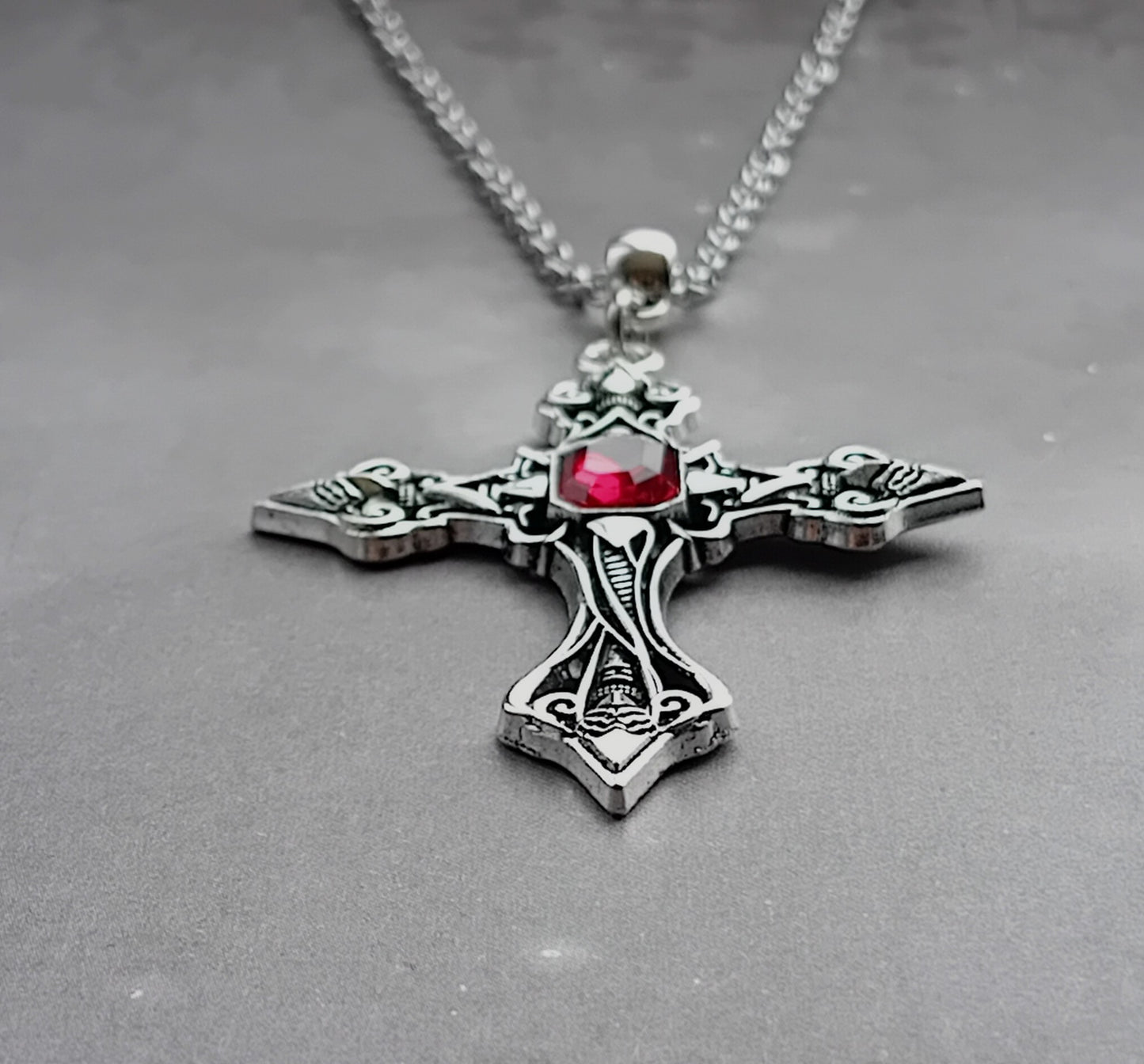 Patterned Cross Necklace with Red Stone