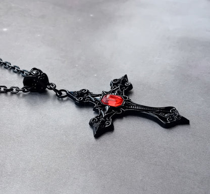 Black Patterned Cross with Red Stone