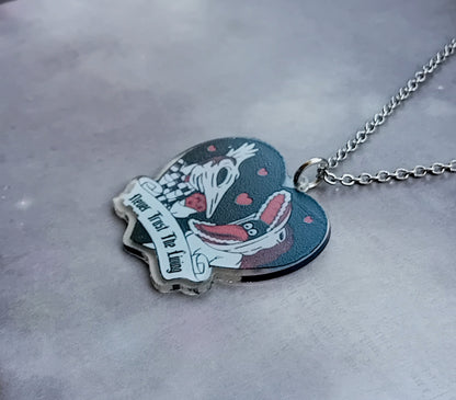 Beetlejuice Necklace with Adam and Barbara.