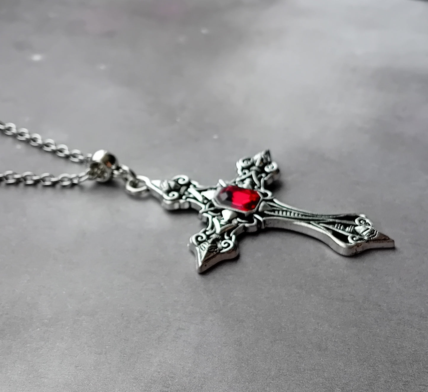 Patterned Cross Necklace with Red Stone