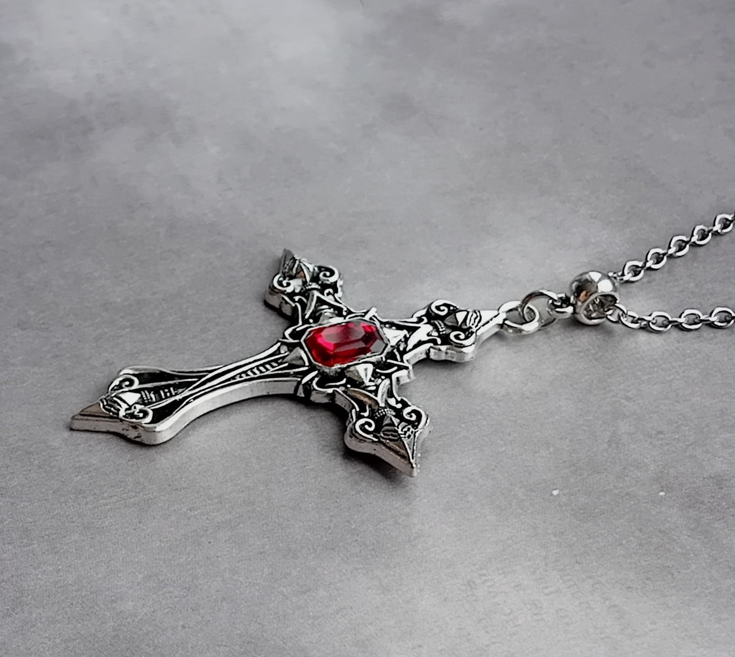 Patterned Cross Necklace with Red Stone