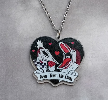 Beetlejuice Necklace with Adam and Barbara.