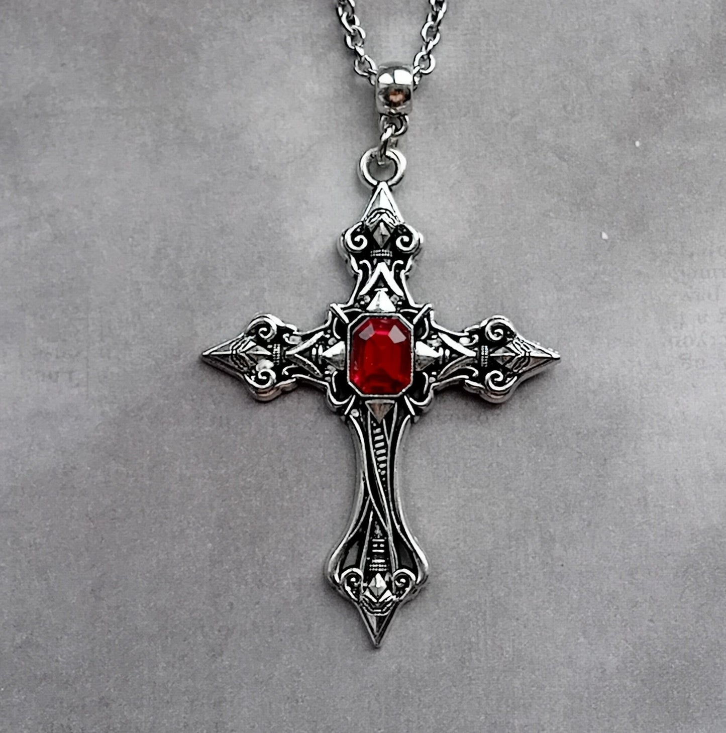 Patterned Cross Necklace with Red Stone