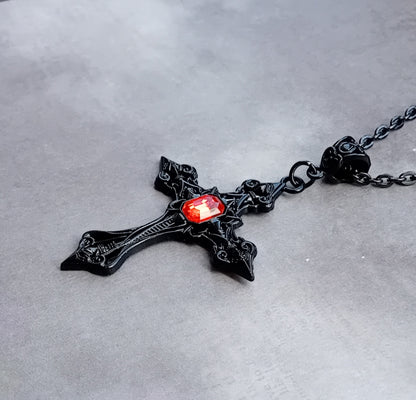 Black Patterned Cross with Red Stone