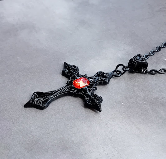 Black Patterned Cross with Red Stone